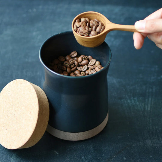 Storing Coffee Beans - Ceramic Lab Canister Large in Black from Kinto, this porcelain mug uses sandstone unique to the Hasami region in Japan. It gives the product a beautiful rough quality whilst also being delicate and a pleasure to use.