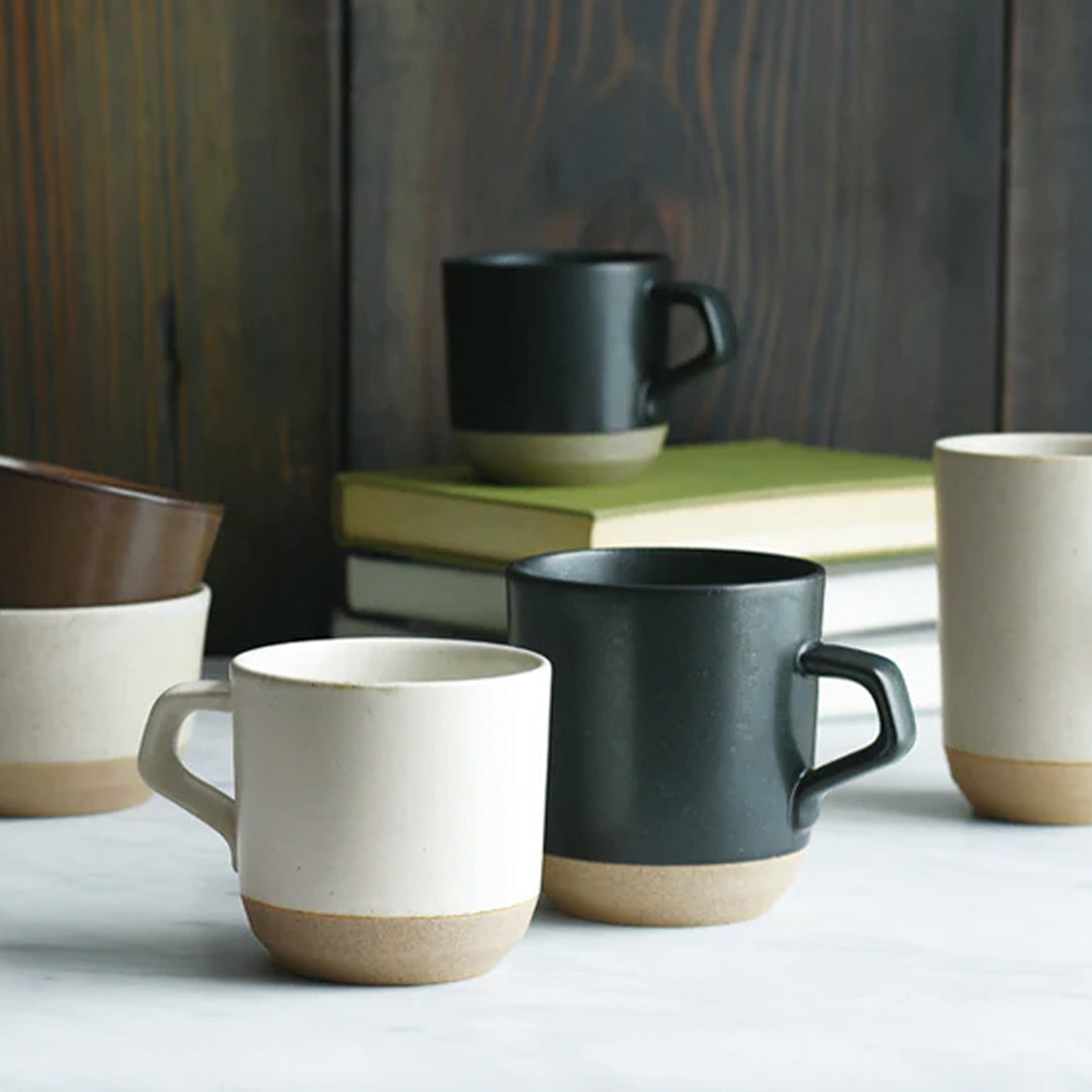 This Ceramic Lab Black Mug is constructed with porcelain and is designed to hold 360ml of liquid. The dimensions are φ90mm x H100mm x W115mm, making it suitable for regular use. Its ceramic construction is microwave and dishwasher safe, ensuring long-term durability and convenience.