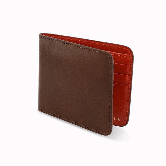 Classic Cognac and Orange leather wallet from Escuyer, featuring a rich brown toned leather on the outside, with orange leather interior.