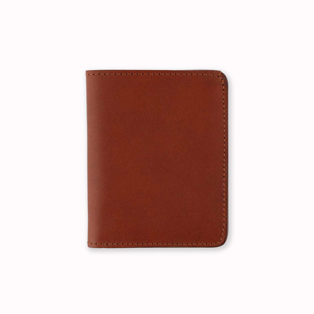 Cognac slim leather wallet from Escuyer, in a rich Cognac brown toned leather. Handmade by Portuguese artisans from leather sourced from a tannery in Tuscany, Italy.