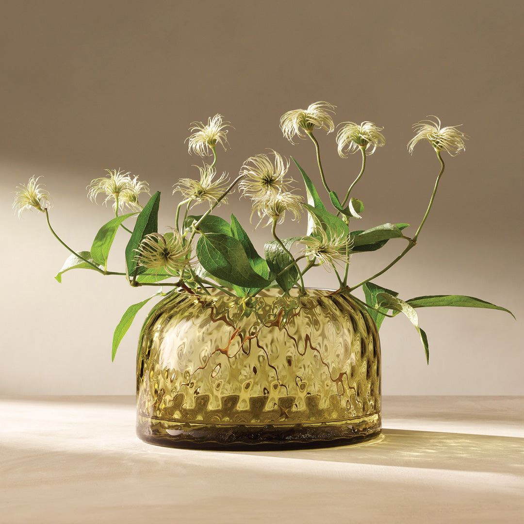 Forest Green Dapple Vase - This medium sized vase is perfect for low floral arrangements but can equally be used as candle lantern where the textured surface creates a patterned glow in a room.