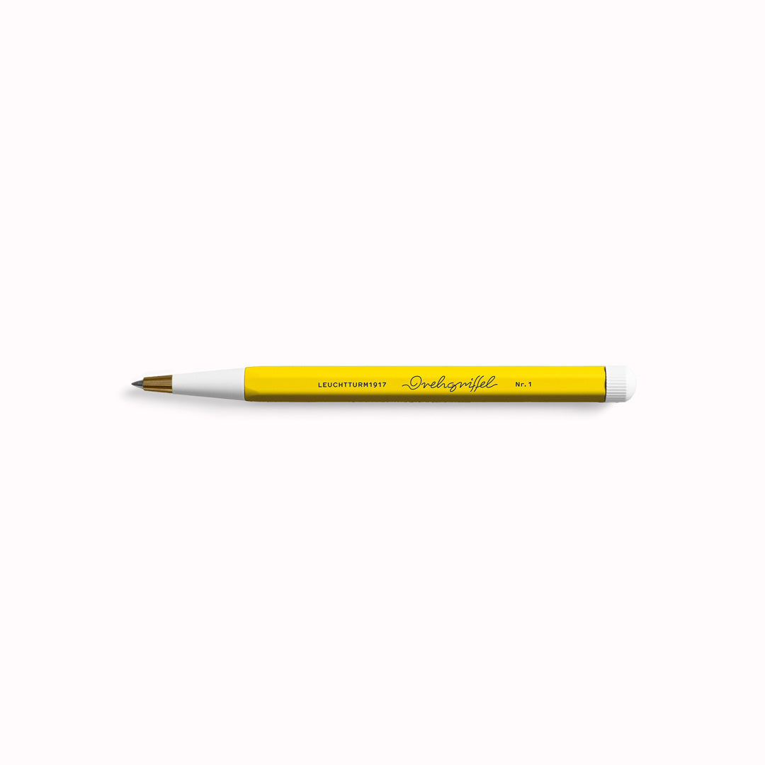 Lemon Drehgriffel Nr. 1. Inspired by the design dating back to the 1920s, the hexagon-shaped barrel of the Drehgriffel Nr. 1 pen and the tapered tip which, along with the twist button, come in a contrasting colour to the barrel, makes for a striking statement. It is comfortable to hold and the design has won several awards. A homage to the art of writing.