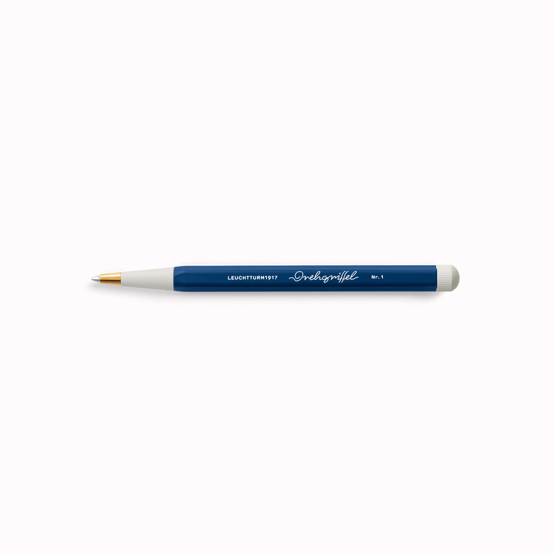 Navy Drehgriffel Nr. 1. Inspired by the design dating back to the 1920s, the hexagon-shaped barrel of the Drehgriffel Nr. 1 pen and the tapered tip which, along with the twist button, come in a contrasting colour to the barrel, makes for a striking statement. It is comfortable to hold and the design has won several awards. A homage to the art of writing.