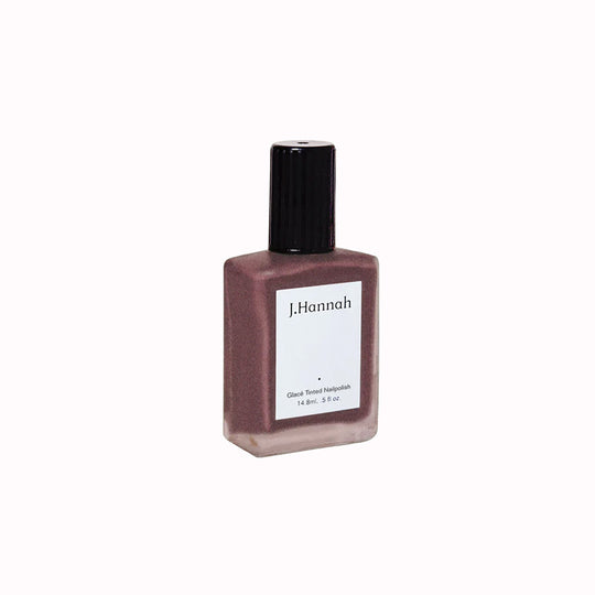 Gamay nail polish by J.Hannah is a tinted red wine colour, inspired by the sheer shades of watercolours and wine stained teeth. An amethyst shade that deepens with multiple layers.