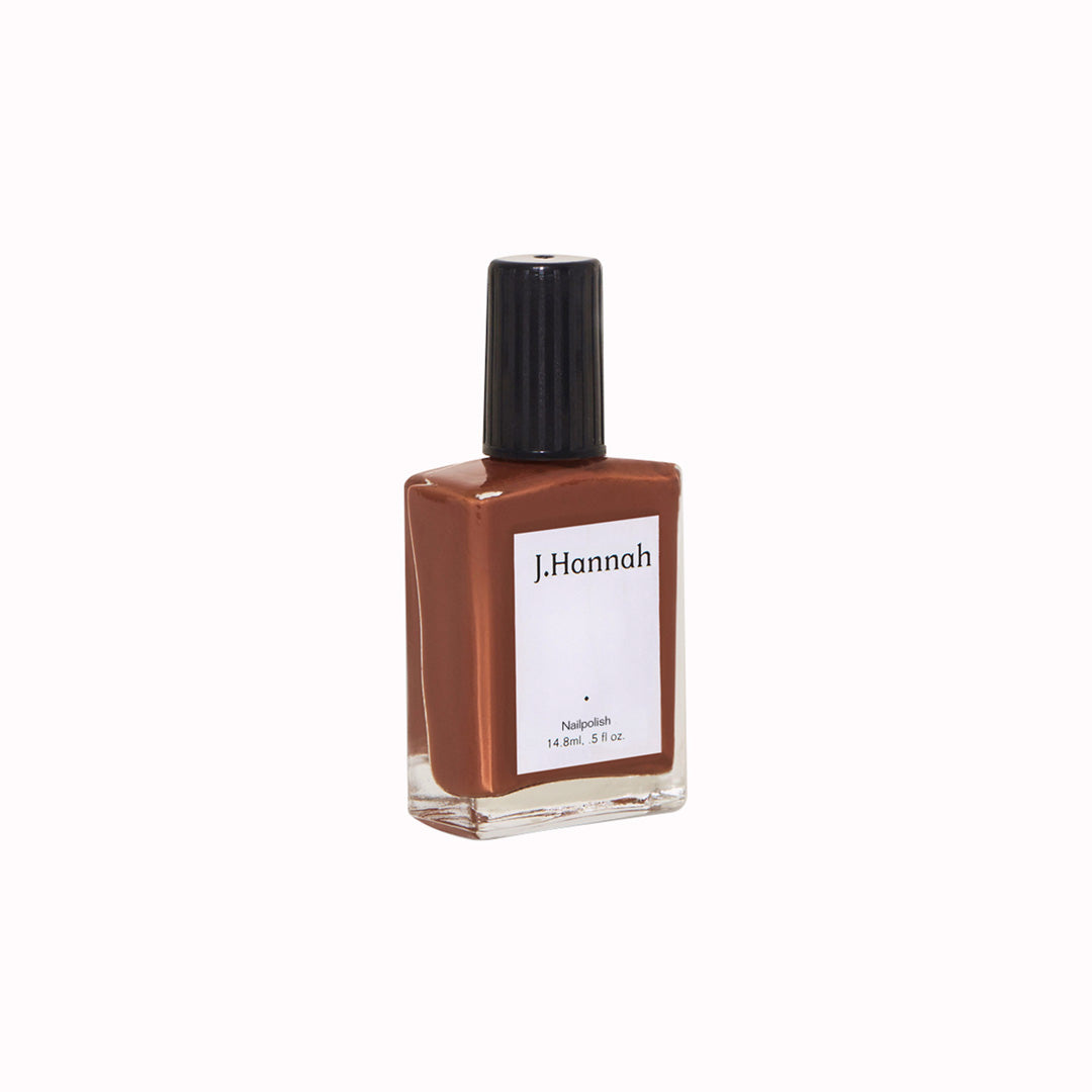 Ghost Ranch nail polish by J.Hannah is a rich brick clay shade of red inspired by the red rock of Georgia O'Keeffe's Purple Hills Ghost Ranch painting. 