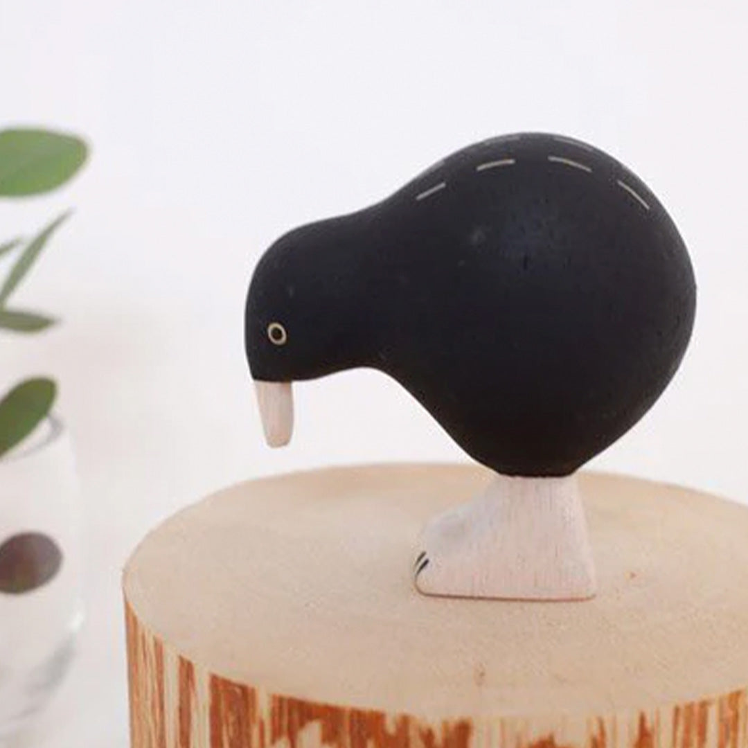 Gorgeous handmade wooden Kiwi on log, detail from the Pole Pole collection by Japanese brand T-Lab.