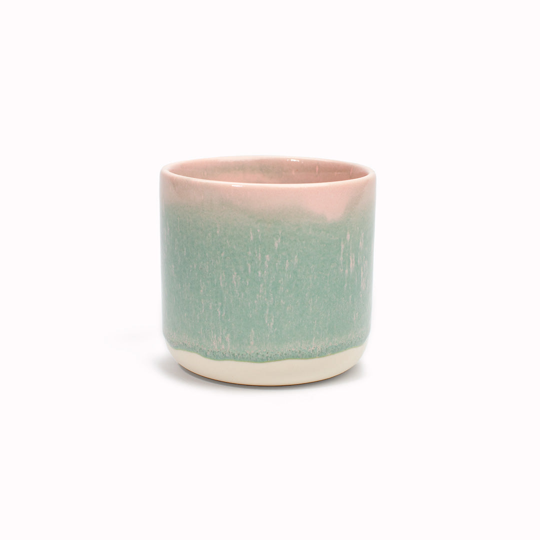 This delicate green mug with pink rim is handmade in Denmark - meaning glaze colour and finish will never be exactly the same on any two items, but this is absolutely a part of their unique appeal.