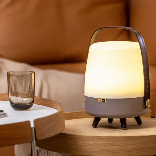 The Lite-up Play Mini Lamp by Kooduu is a remarkable combination of design and technology, offering not just illumination but also high-quality audio from JBL Sound.  This compact and portable lamp brings a touch of modern elegance to any space, with its warm white light that can be adjusted to suit the mood or setting.