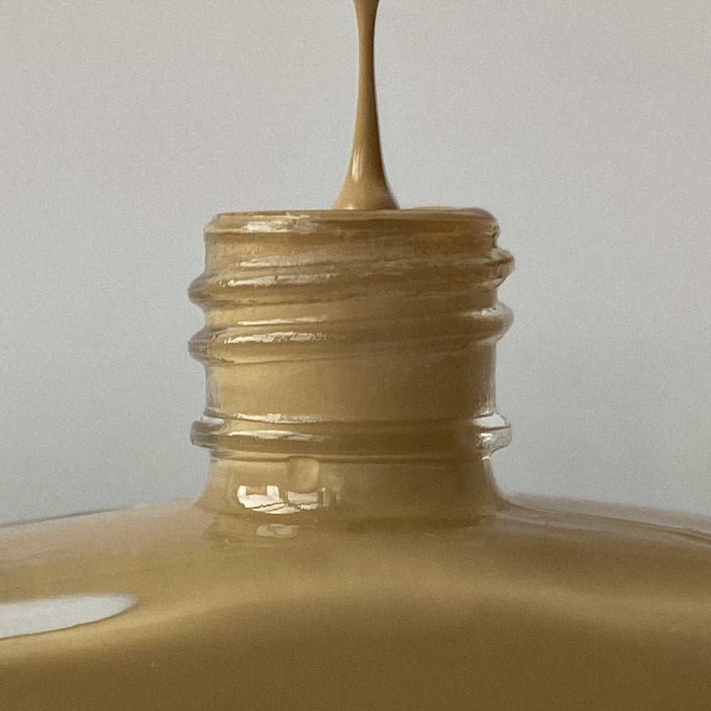 Bottle Neck Detail. Miso nail polish by J.Hannah is a savoury beige neutral with green undertones and is inspired by miso paste - if it were possible to bottle 'umami' this is what it would look like - a creamy neutral, with added depth. 