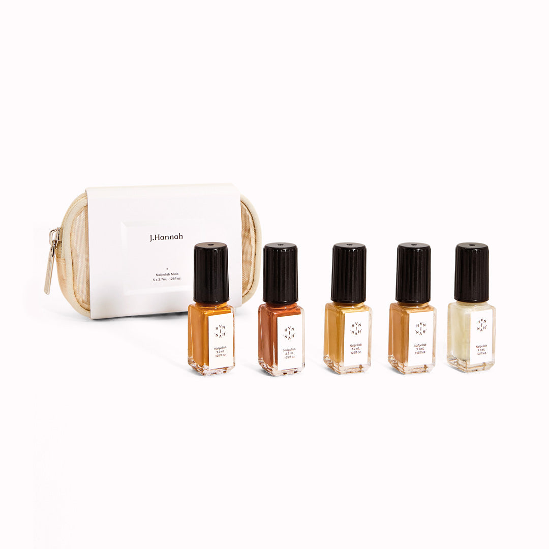 The Classics Mini Nail Polish Set by J.Hannah includes five of their classic colour shades in petite bottles: Akoya, Dune, Fauna, Ghost Ranch and Miso. Packaged in a reusable mesh zipper pouch, the Classics Mini Polish Set is designed for gifting and travel.