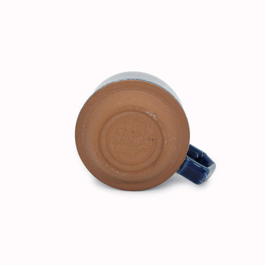 Compact and Easy to hold and stackable for easy storage. This Splash mug has a white glaze playfully sprayed over deep navy with an unglazed base. They are sturdy and comfortable to hold with a unique silhouette.