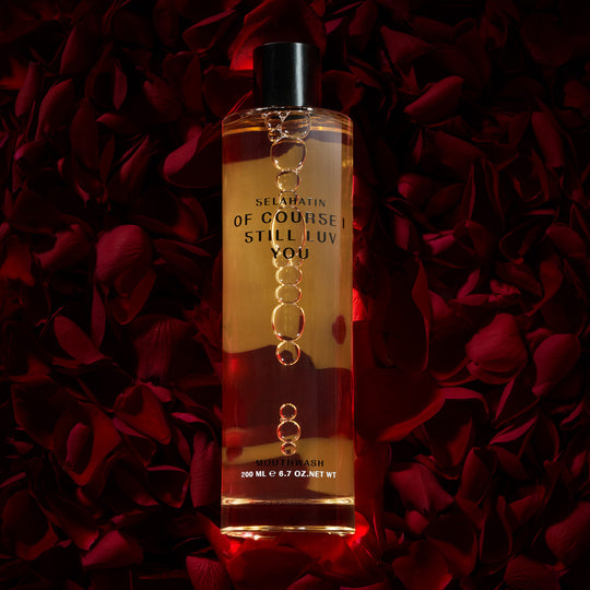 Of Course I Still Love You is a Verbena, Bergamot, Cardamom & Pine premium mouthwash from luxury oral care brand, Selahatin - lifestyle image on rose petals