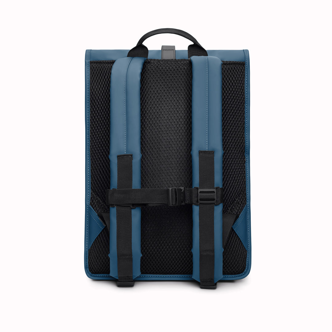 Rolltop Rucksack is Rains’ take on a cycling backpack. Made from Rains’ signature waterproof fabric, this functional backpack has a roll-top closure with an adjustable strap featuring a loop for a bike lock or similar.