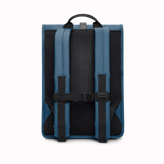 Rolltop Rucksack is Rains’ take on a cycling backpack. Made from Rains’ signature waterproof fabric, this functional backpack has a roll-top closure with an adjustable strap featuring a loop for a bike lock or similar.