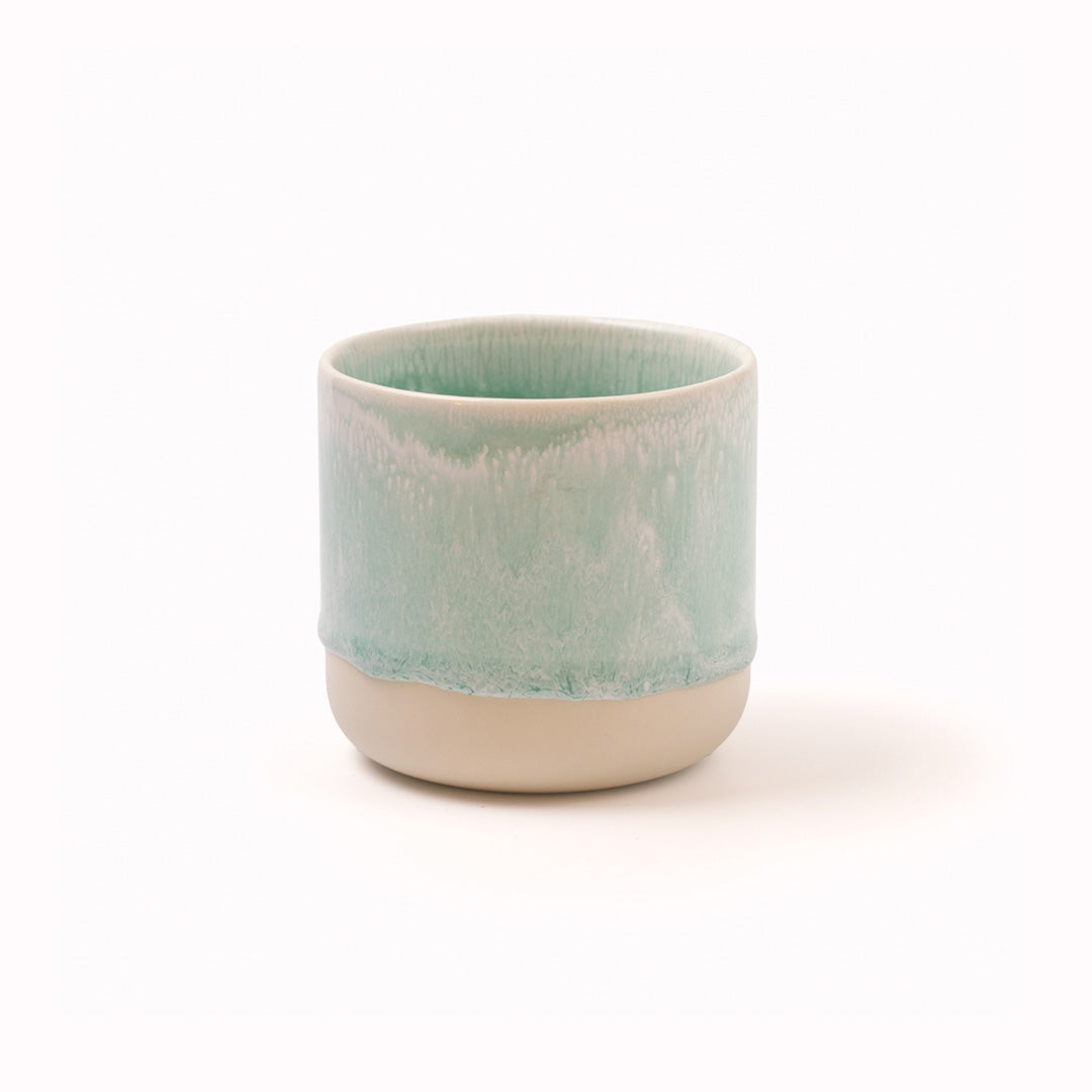 The Spearmint Quench Cup is handmade in Denmark - meaning glaze colour and finish will never be exactly the same on any two items, but this is absolutely a part of their unique appeal.