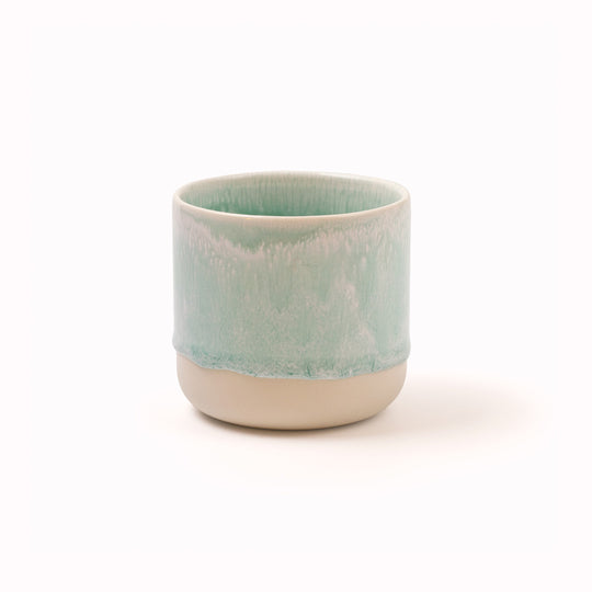 The Spearmint Quench Cup is handmade in Denmark - meaning glaze colour and finish will never be exactly the same on any two items, but this is absolutely a part of their unique appeal.
