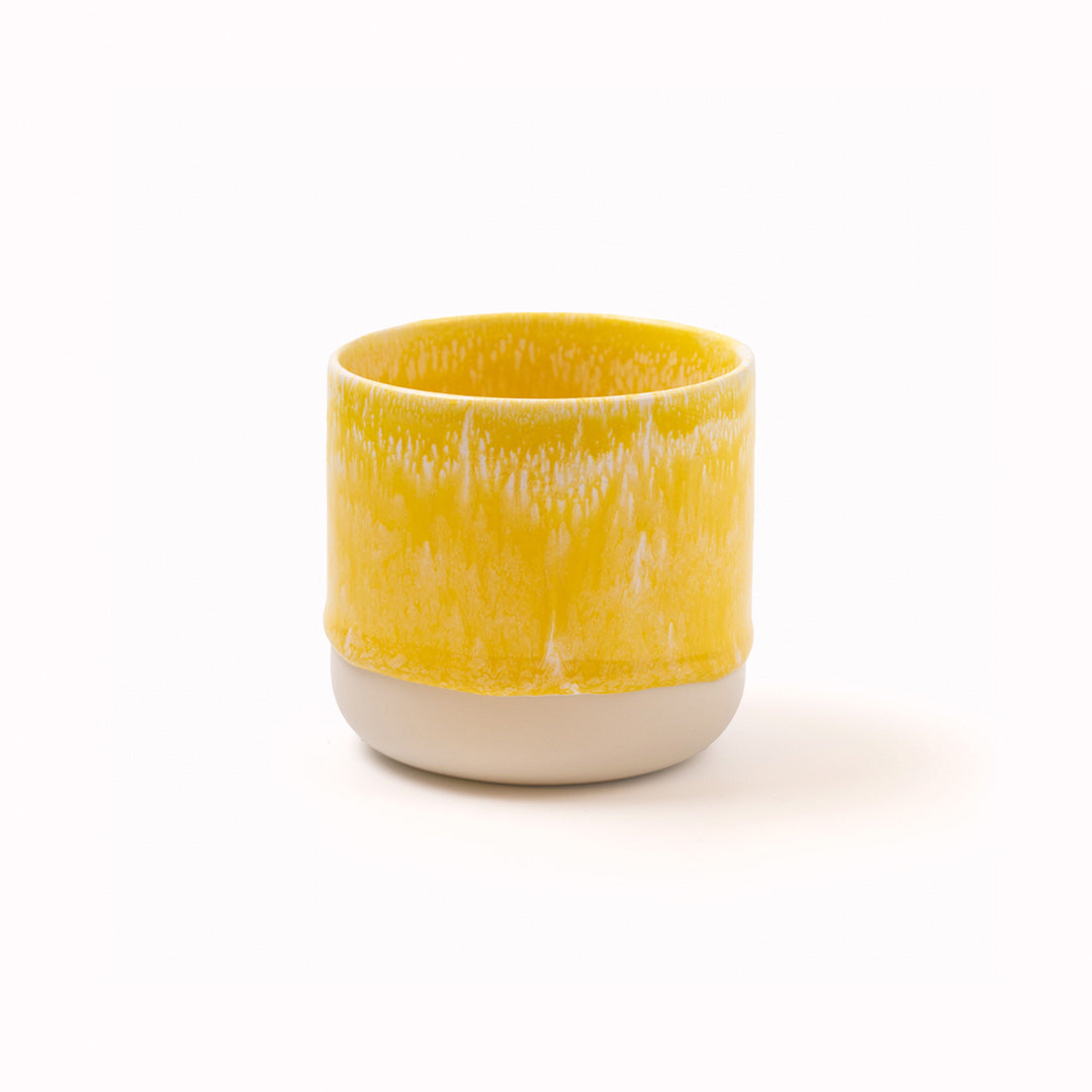 Sunbeam Yellow Quench cup, Each piece is handmade in Denmark - meaning glaze colour and finish will never be exactly the same on any two items, but this is absolutely a part of their unique appeal.