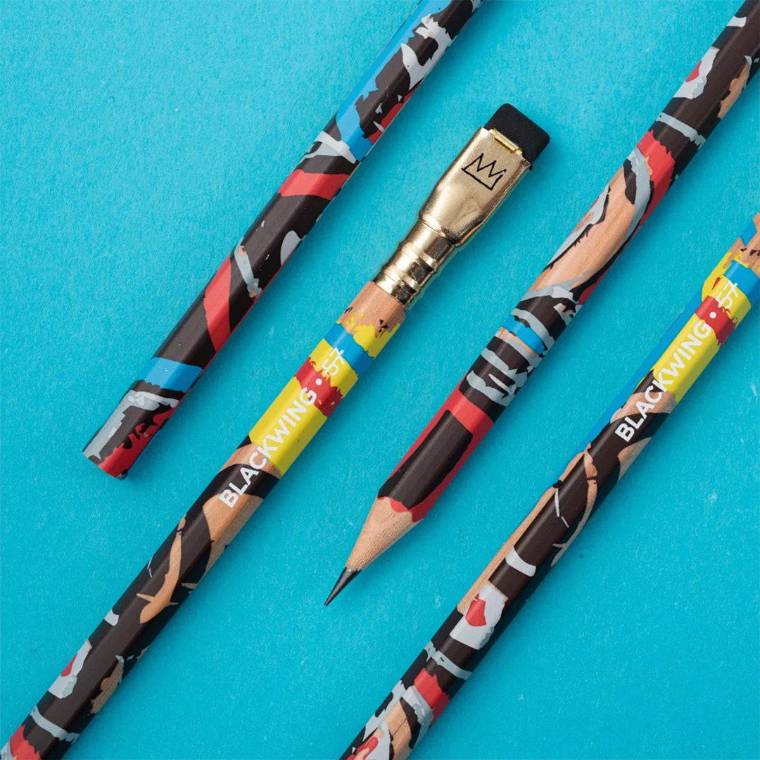Pencils collection. Special Edition Blackwing Pencil Set Volume 57 is a tribute to the boundary pushing NY artist Jean-Michel Basquiat. Each pencil features elements of his street style artwork and recognisable crown icon. The pencil has Blackwing's soft graphite lead, perfect for sketching, and a black replaceable eraser tip.