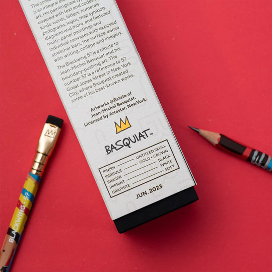 Rear of Box. Special Edition Blackwing Pencil Set Volume 57 is a tribute to the boundary pushing NY artist Jean-Michel Basquiat. Each pencil features elements of his street style artwork and recognisable crown icon. The pencil has Blackwing's soft graphite lead, perfect for sketching, and a black replaceable eraser tip.