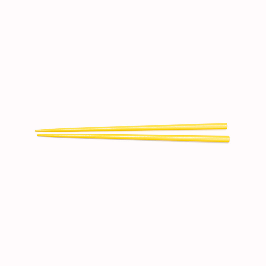 Yellow Textured Lacquerware Chopsticks from Made in Japan. This Chopstick collection is designed and made at the Zumi workshop in Fukui prefecture, Japan. This region of Japan has a 1500-year-old history of crafting with Lacquer. 