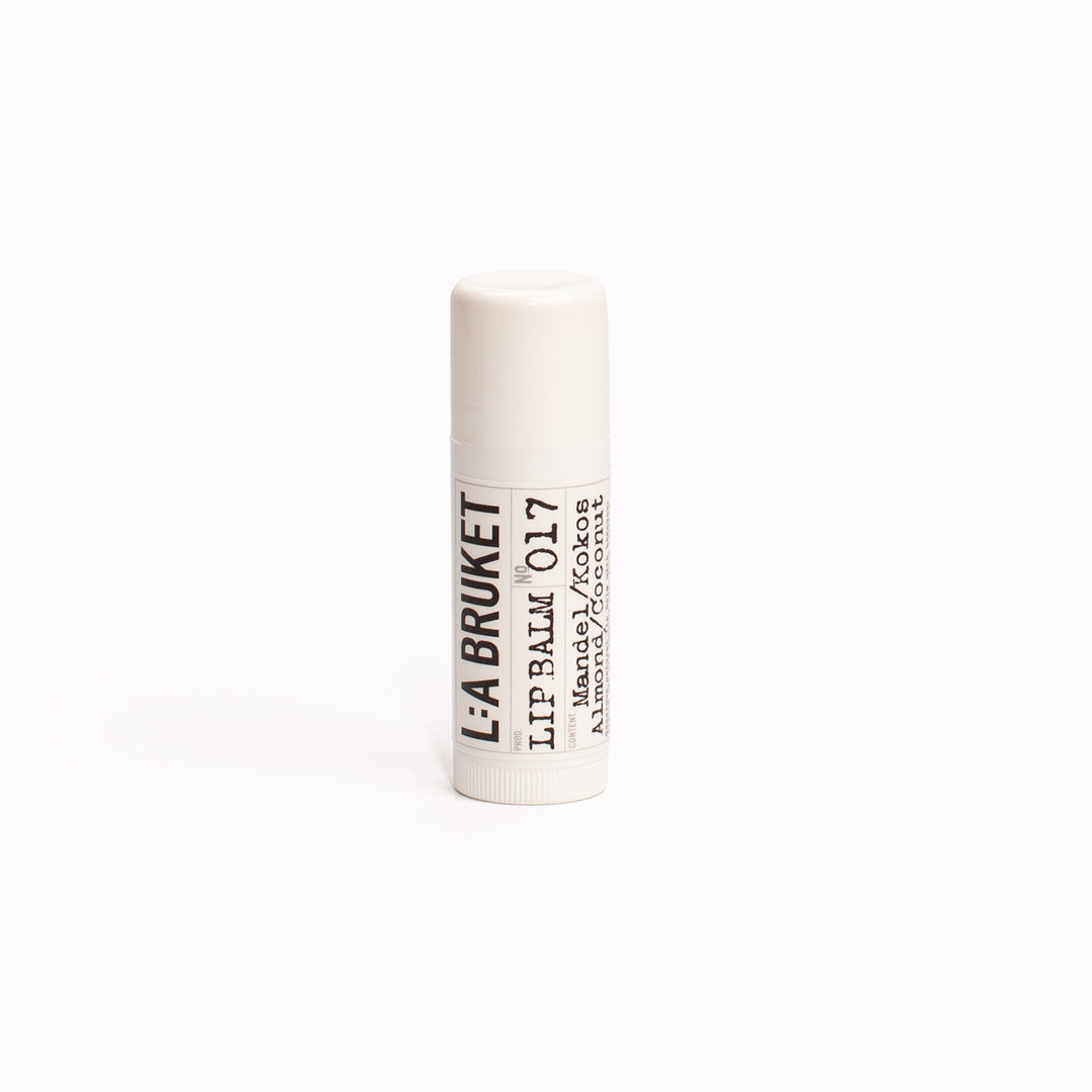 Almond and Coconut Lip Balm | 017 | L:A Bruket. Lip Balm 017 by L:A Bruket is a generous, organic lip balm with beeswax, almond oil and coconut oil, providing a long lasting moisturising and nourishing effect in hot and dry or freezing climates.