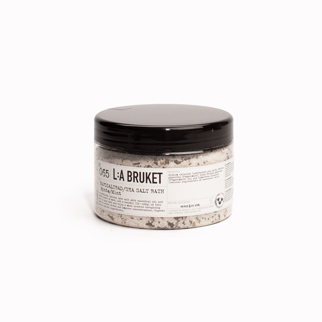 Peppermint Sea Salt Bath | 065 | La Bruket. Bath salts with peppermint on a base of sea salt to cleanse the skin. Contains mint leaves as well as essential oil of peppermint, said to increase concentration and counteract tiredness and stress. Natural Swedish self-care by L:A Bruket.