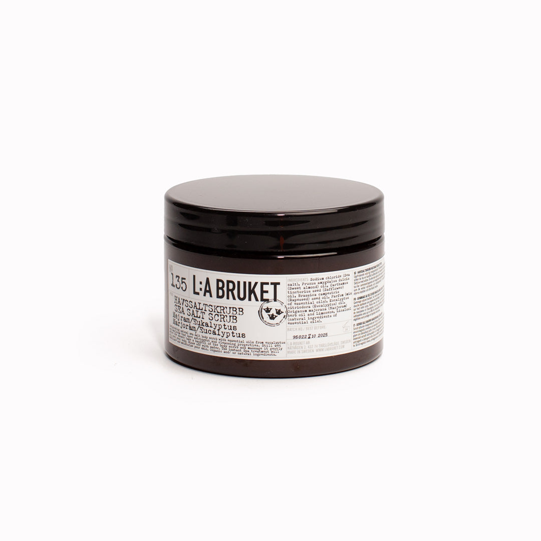 Marjoram and Eucalyptus Sea Salt Scrub from L:A Bruket. A natural sea salt scrub, containing eucalyptus and marjoram essential oils for their repairing and calming properties, and almond oil. Effectively removes dead skin cells, softening your skin and helping to increase circulation. Natural Swedish skincare from L:A Bruket.