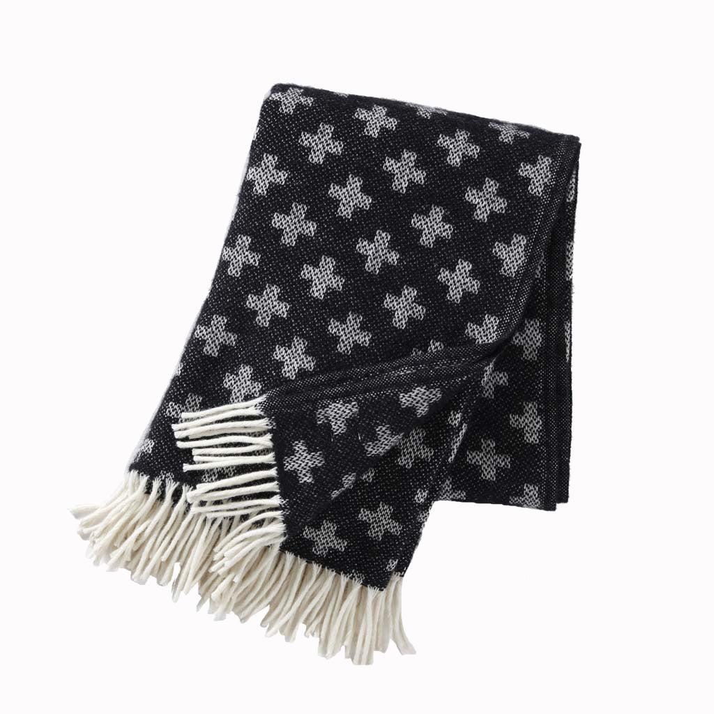 Classic soft lambswool Plus throw in a graphic pattern in black and white, from Scandinavian manufacturer Klippan.