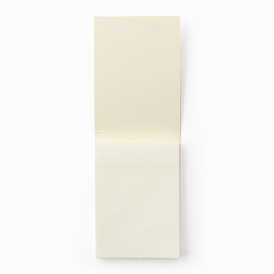 Showing plain pages. A7 memo pad with embossed off-white cover and plain sheets. Designed to work alongside the MD Paper notebook series, it uses the same quality paper and same plain layout so you can seamlessly add notes into pages in your MD Paper Plain notebook. It is sticky on one side, but you can write on both sides. 80 tear off pages.