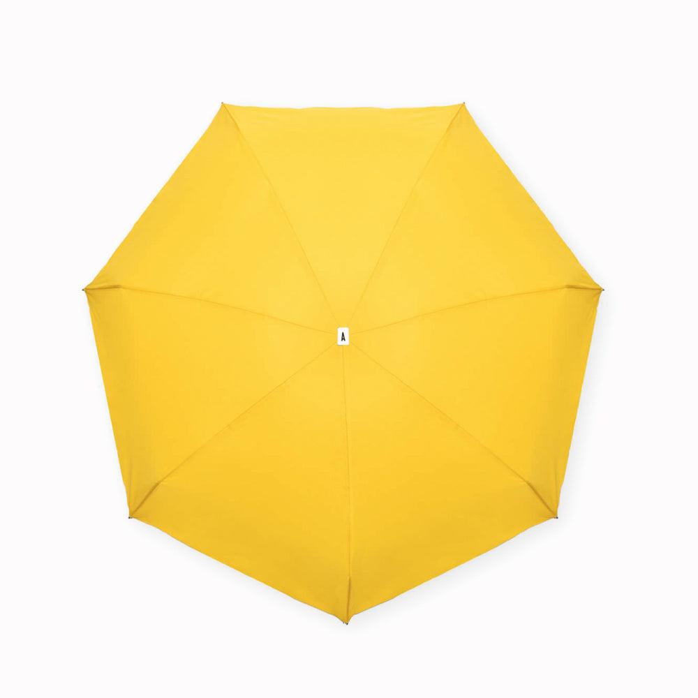 Martin, Juane is a brightly coloured, ultra light-weight folding umbrella by Anatole, Paris. Open View