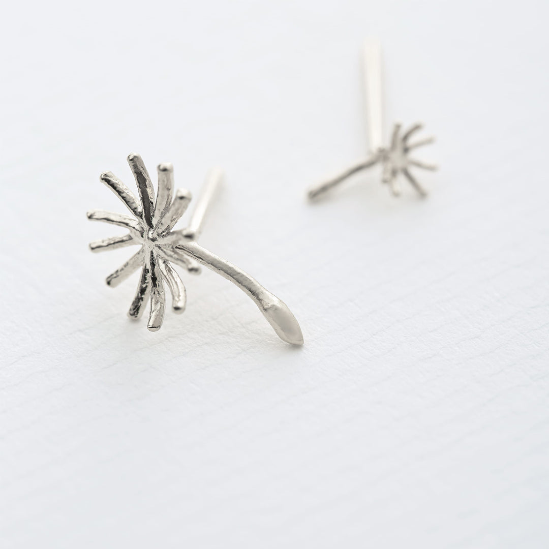 Asymmetric Dandelion Fluff Sterling Silver Stud Earrings close up on a white background by Alex Monroe