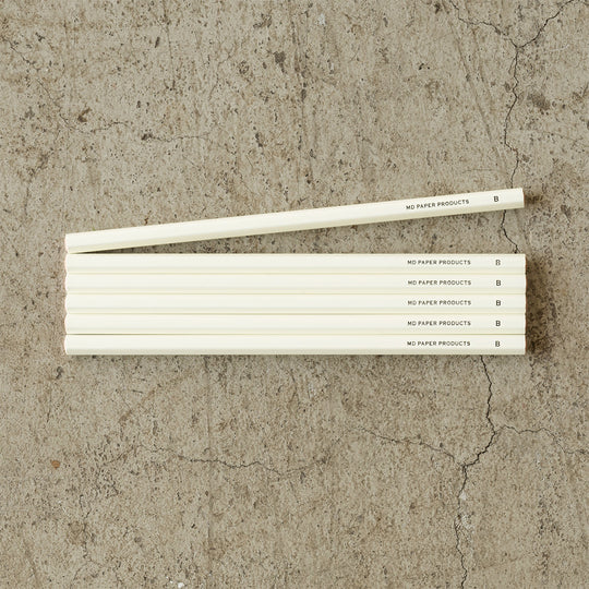Beautiful, minimal set of 6 'B Grade' pencils for notes or sketching from Japanese stationery company MD Paper. This set contains 6 pencils. Each pencil has a diameter of 7mm and is 176mm in length, and they are suitable for a range of drawing and sketching techniques. The soft lead provides smooth lines for detail work. 6 pencils shown