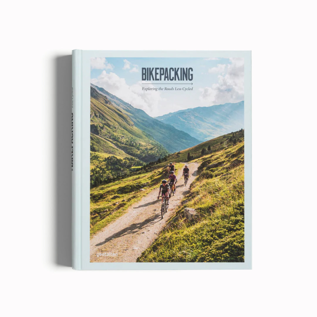 Bikepacking Book by Gestalten, Cover Image, Exploring The Roads Less Travelled. Exploring journeys in different regions around the world, introducing the people and culture around it, and giving you the lowdown of all the tips and tricks, this book presents the insights and inspiration to plan your expeditions. Whether beginner or experienced, this is a journey for everyone to enjoy.