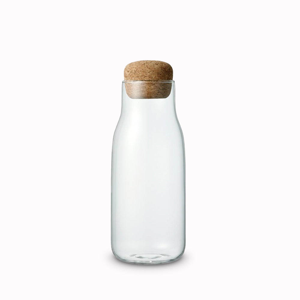 Small 300ml heat resistant glass canister with cork stopper, suitable for storing kitchen pantry essentials such as coffee beans from Kinto - Japanese Tableware