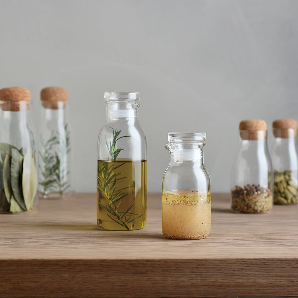Bottlit - Heat resistant glass bottles with air tight lid and pourer, suitable for salad dressing. Silicone rim on lid for a snug fit from Kinto - Japanese Tableware