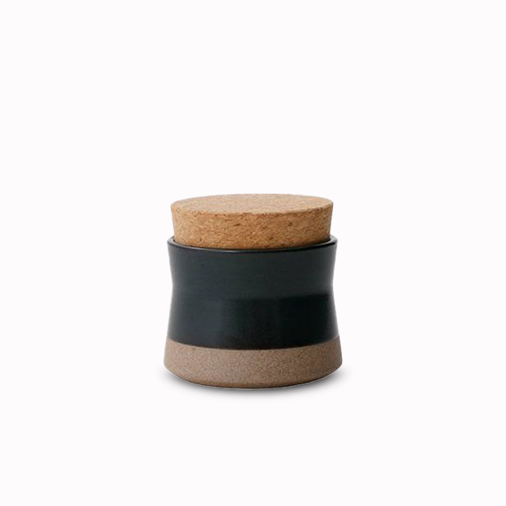 Ceramic Lab Canister in Black from Kinto, this porcelain mug uses sandstone unique to the Hasami region in Japan. It gives the product a beautiful rough quality whilst also being delicate and a pleasure to use.
