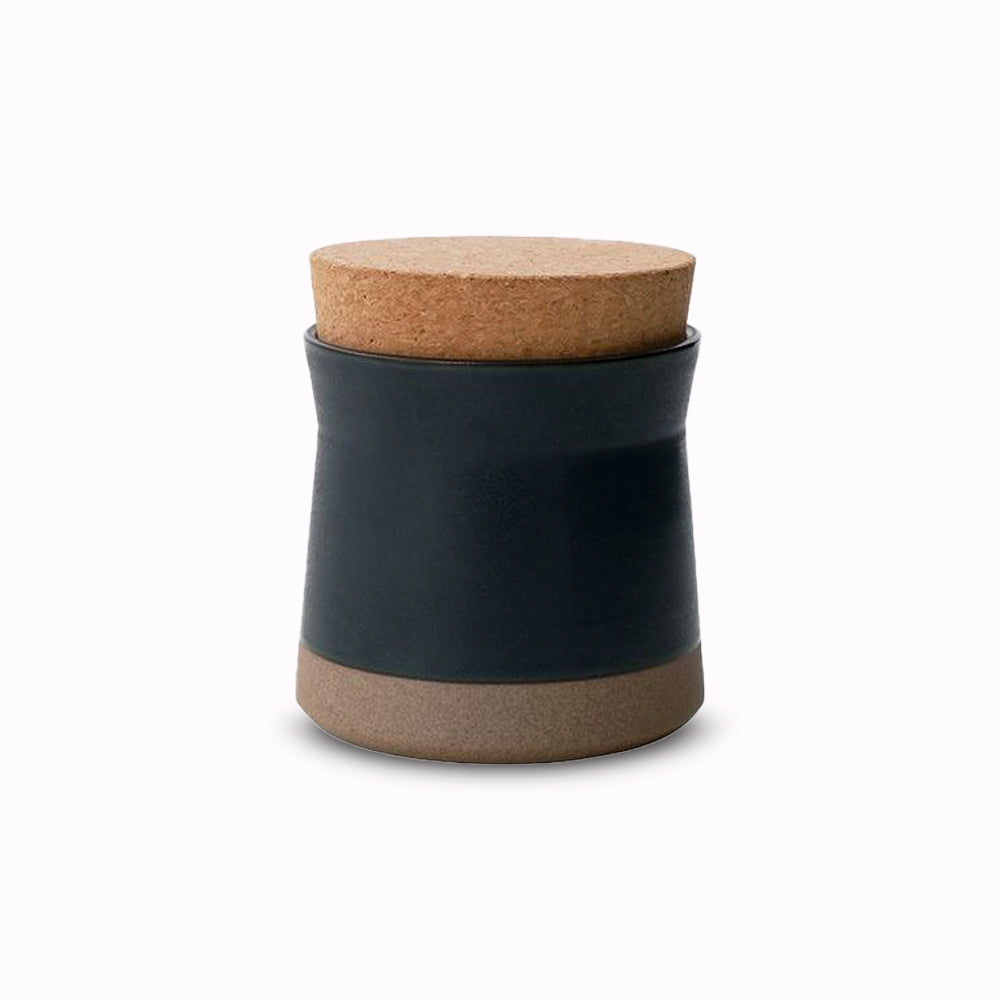 Ceramic Lab Canister Large in Black from Kinto, this porcelain mug uses sandstone unique to the Hasami region in Japan. It gives the product a beautiful rough quality whilst also being delicate and a pleasure to use.