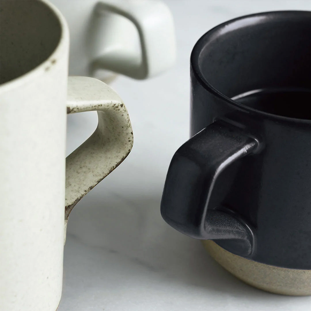 Ceramic Lab Mug Detail from Kinto, this porcelain mug uses sandstone unique to the Hasami region in Japan. It gives the product a beautiful rough quality whilst also being delicate and a pleasure to use.