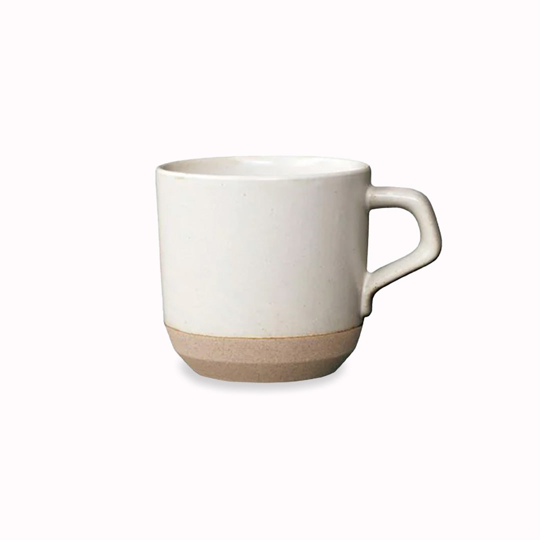 Ceramic Lab Mug in White from Kinto, this porcelain mug uses sandstone unique to the Hasami region in Japan. It gives the product a beautiful rough quality whilst also being delicate and a pleasure to use.