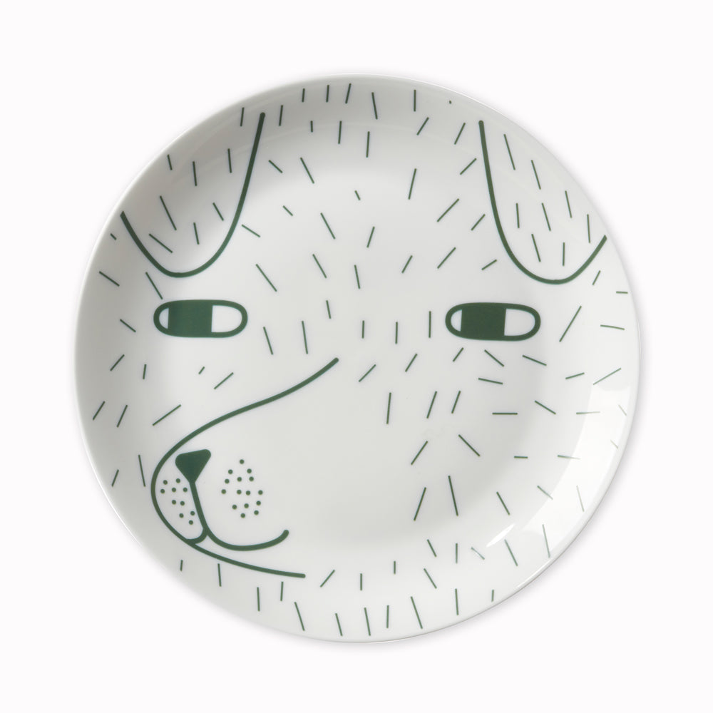 Scamp bone china plate by Donna Wilson. Scamp the Dog looks a bit cheeky but we can assure you he's the perfect companion.  Pair your mug with a Scamp Mug and Scamp Egg Cup , or mix & match with other ceramics.