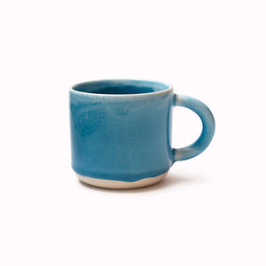 The Chug Mug by Studio Arhoj features their trademark thick, hand poured coloured glaze which means that each mug is unique. These superb mugs have a large handle and hold a good 'chuggable' serving of coffee or tea.