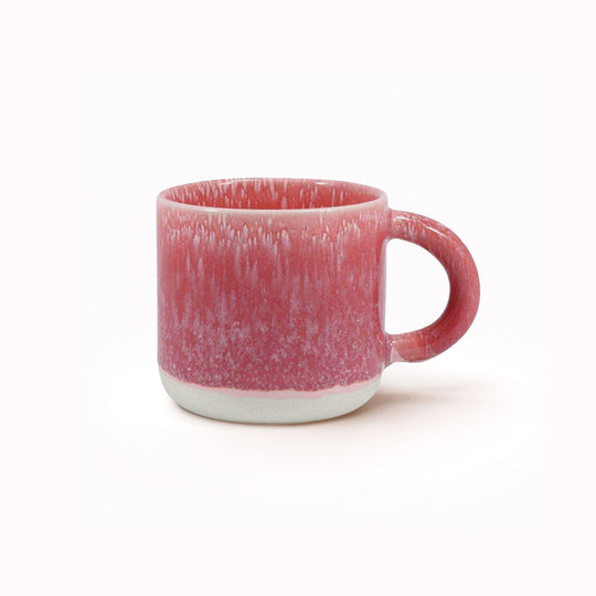 The Chug Mug by Studio Arhoj features their trademark thick, hand poured coloured glaze which means that each mug is unique. These superb mugs have a large handle and hold a good 'chuggable' serving of coffee or tea.