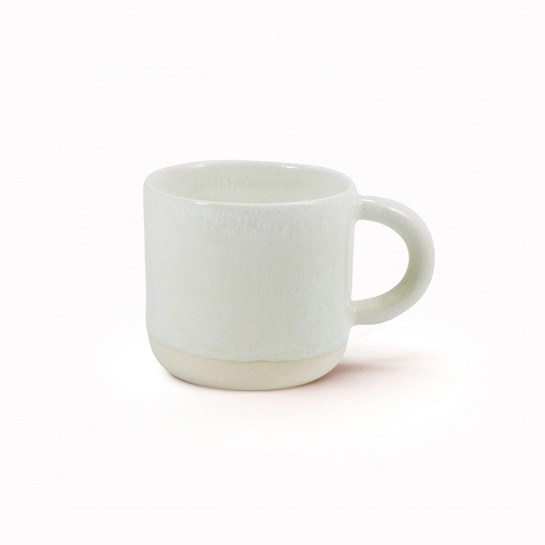 The Chug Mug by Studio Arhoj features their trademark thick, hand poured coloured glaze which means that each mug is unique. These superb mugs have a large handle and hold a good 'chuggable' serving of coffee or tea.