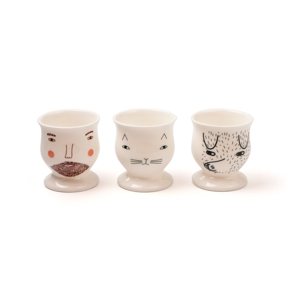 Beardy Man, Mog the cat, and Scamp the dog bone china egg cups by Donna Wilson