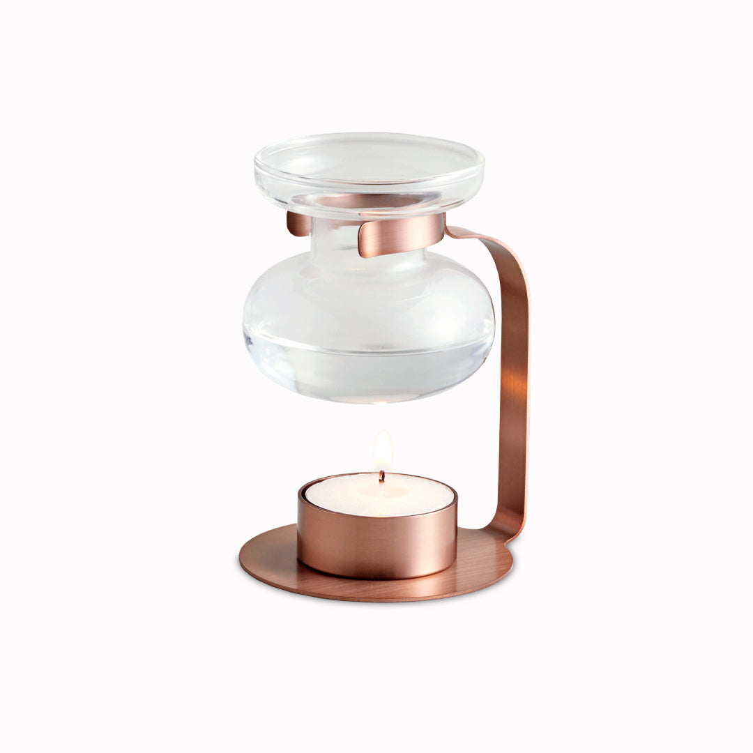 Aroma Oil Warmer in Copper from Kinto for creating a calm environment in your home, using the power of scent and candlelight. 