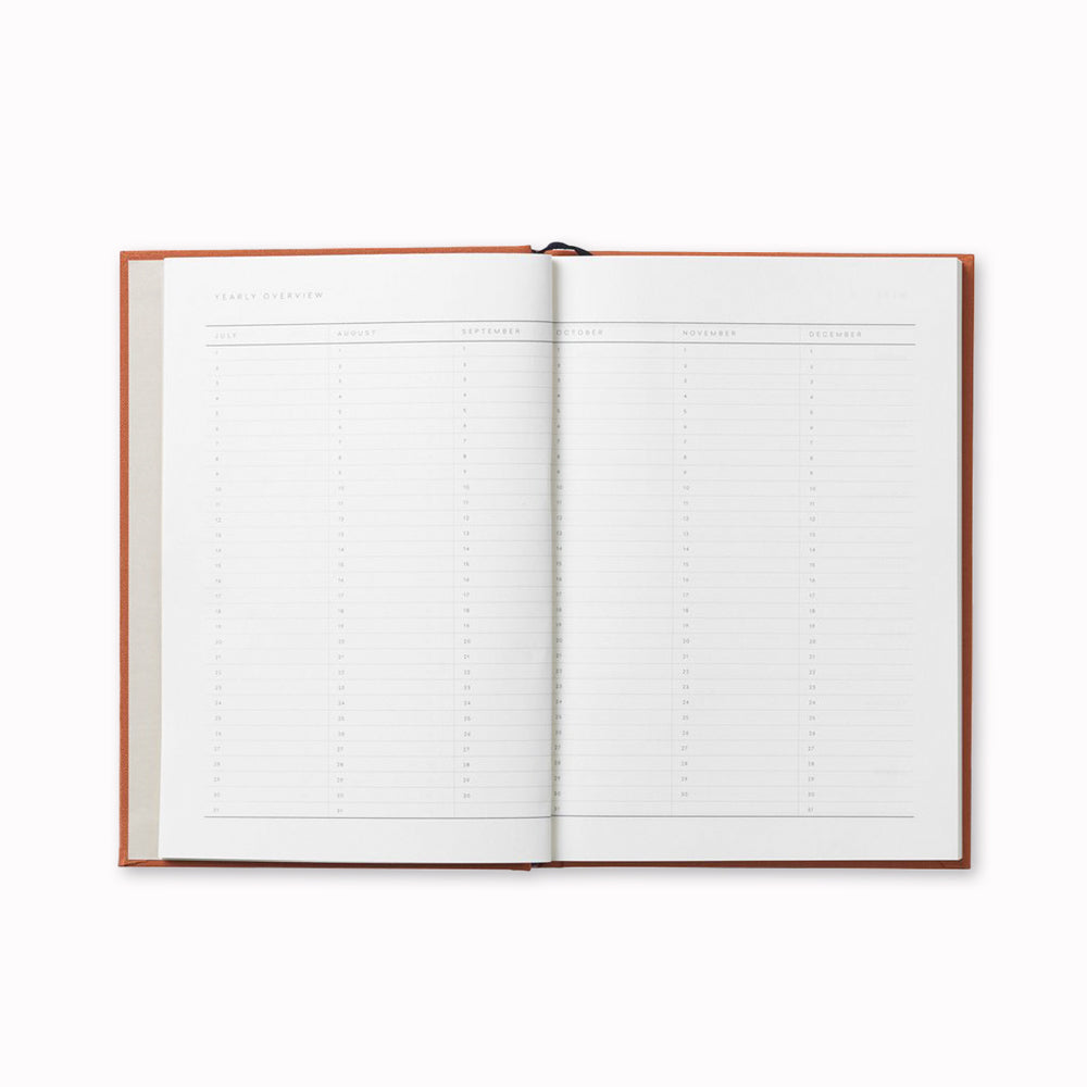 Inside Cover of Notem Even Weekly Journal with Ribbon marker. This notebook is stylish and functional and helps you organize your thoughts and ideas. Days are listed on the left and notes are on the right hand side. It contains areas for contacts and a yearly overview as well as notes and lists.