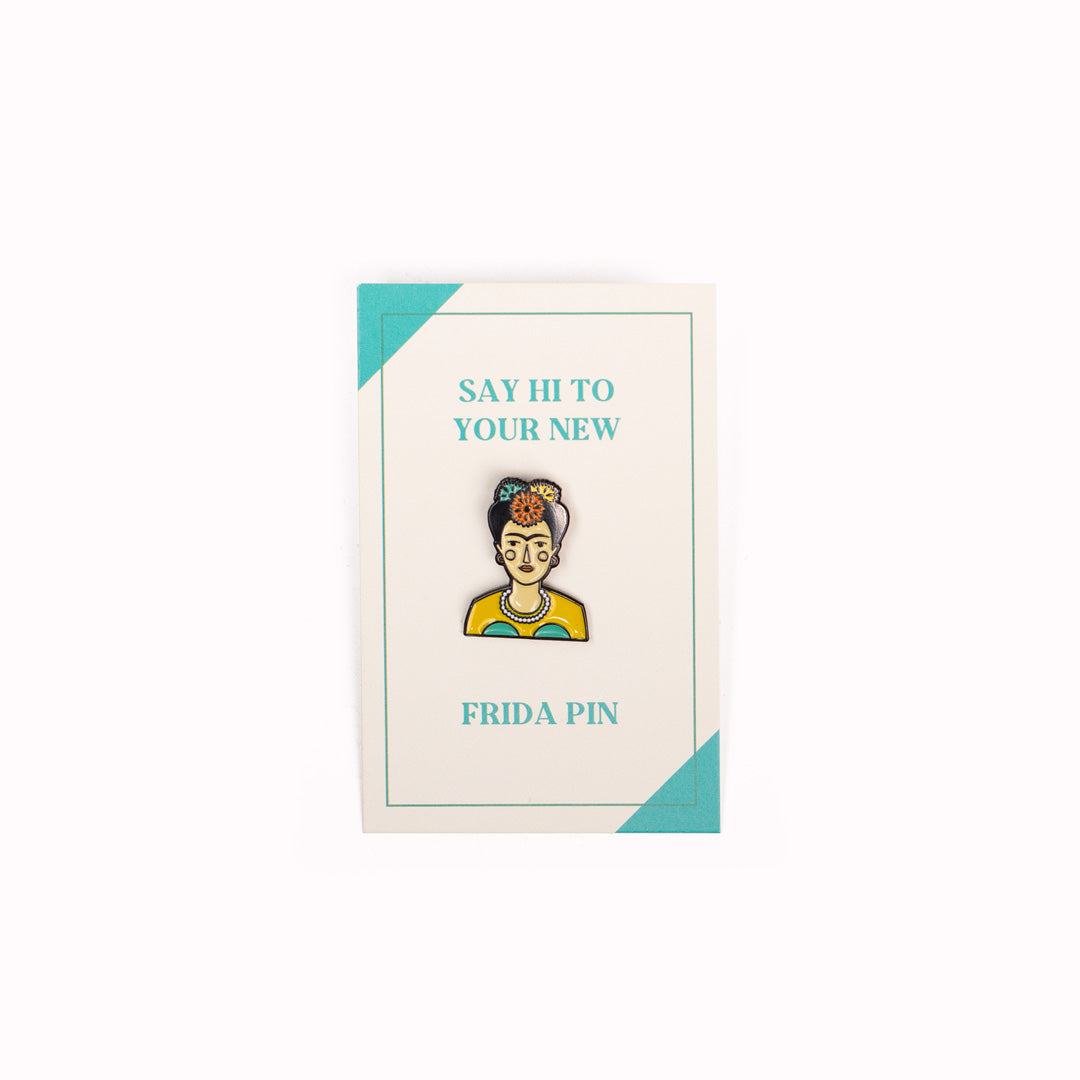 Pin badge design with backing board packagingby Judy Kauffman of feminist icon and artist Frida Kahlo