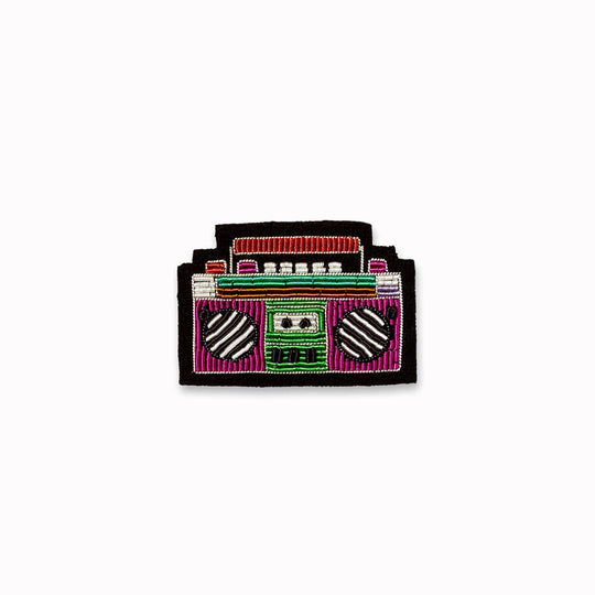 Boom, boom: shake the room! Colourful hand embroidered ghetto blaster lapel pin, From Macon & Lesquoy, French Hand Embroidered badges and patches using Cannetille thread.