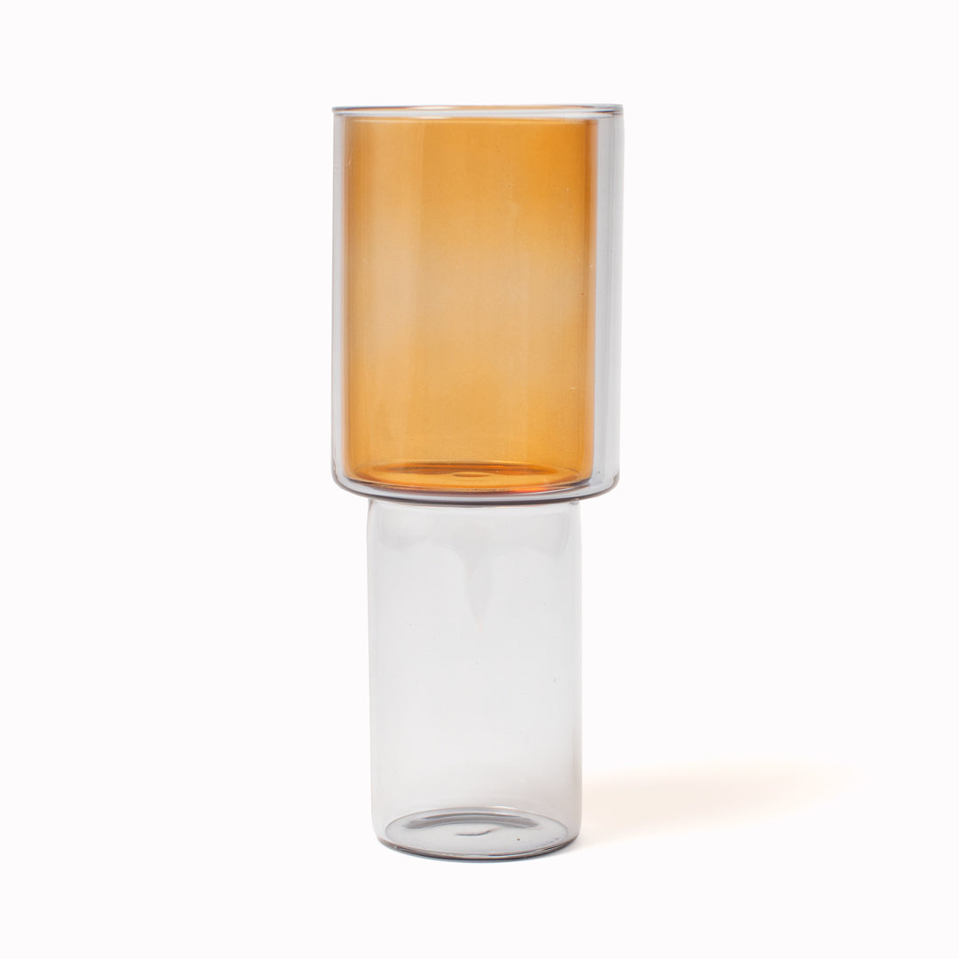 The Grey/Orange stacking vase by Block Design is a cleverly versatile, three-way handmade glass vase crafted from borosilicate glass.