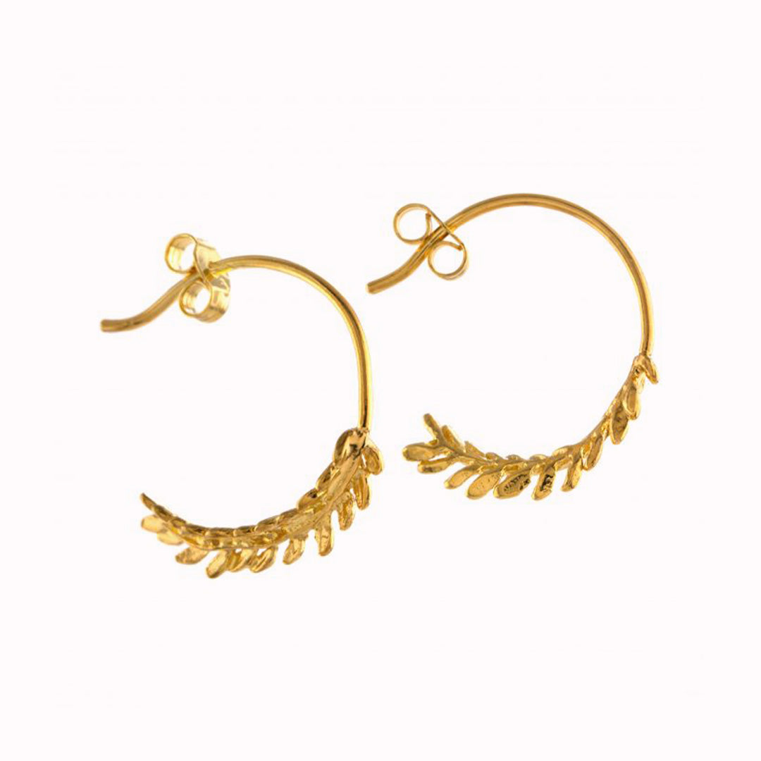 Gold elegant honey fern curves to form a pair of elegant, contemporary hoop earrings by nature inspired Alex Monroe. Perfect for mixing and matching with other Alex Monroe earrings. available in Gold or Silver